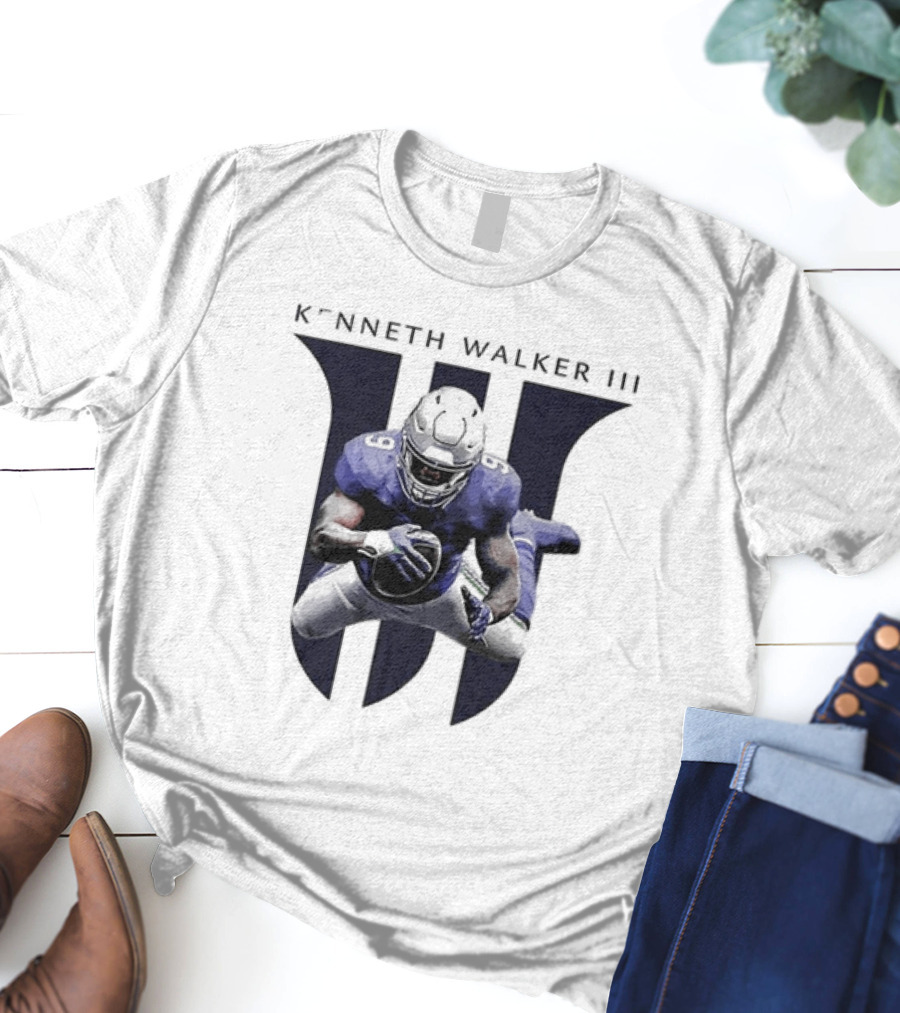 Kenneth Walker III Football Jump In Blue Uniform T-Shirt