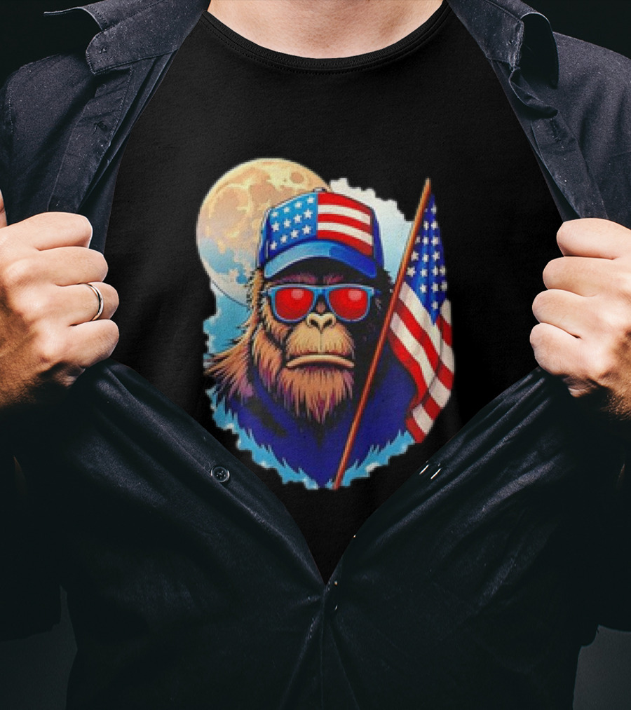 Bigfoot USA Flag Hat Sunglasses Patriotic Moon Background T-Shirt