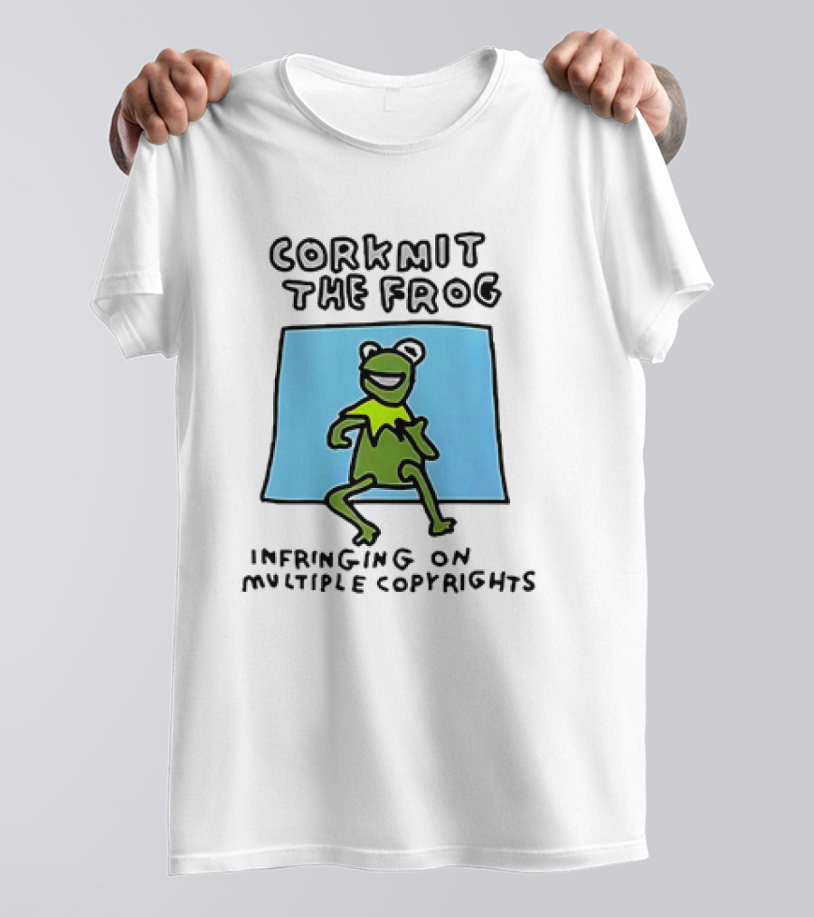 Corkmit The Frog Infringing On Multiple Copyrights Green Frog Cartoon With Blue Background T-Shirt