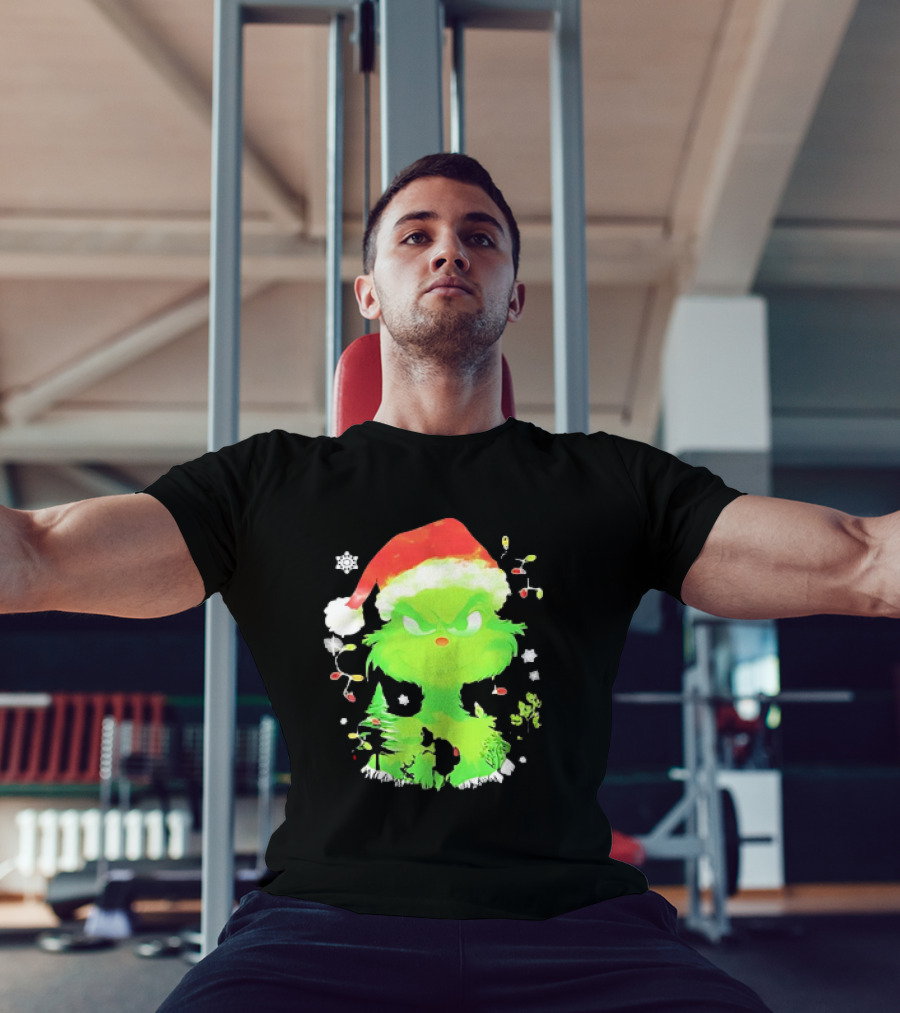 Grinch In Santa Hat Surrounded By Snowflakes And Christmas Lights T-Shirt