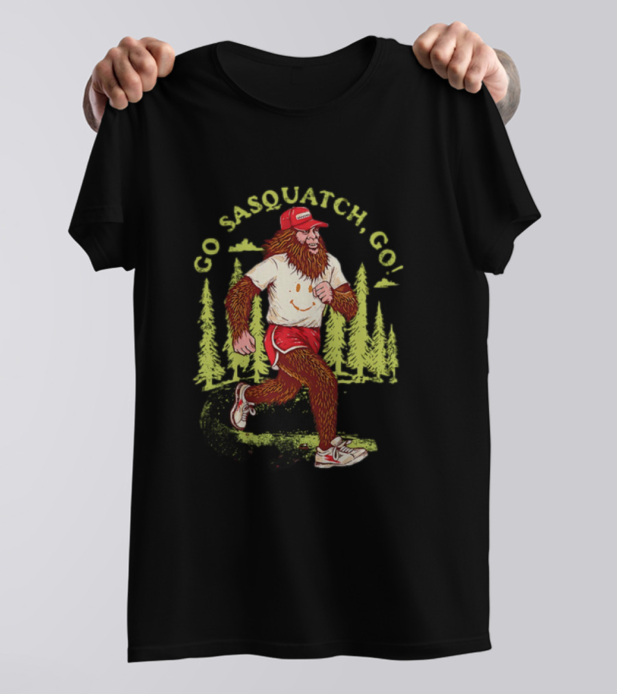 Go Sasquatch Go Bigfoot Jogging In Forest With Red Cap And Sneakers T-Shirt