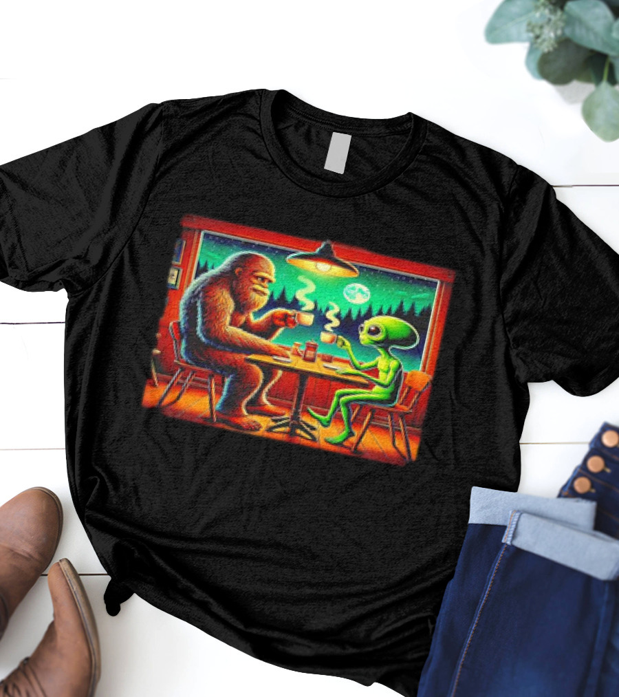 Bigfoot And Alien Coffee Meetup In Cabin At Night With Moonlit Forest T-Shirt