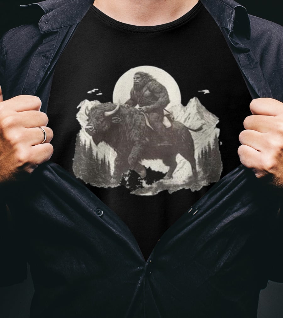 Blurry Creatures Bigfoot Riding Buffalo With Mountains And Moon In Background T-Shirt