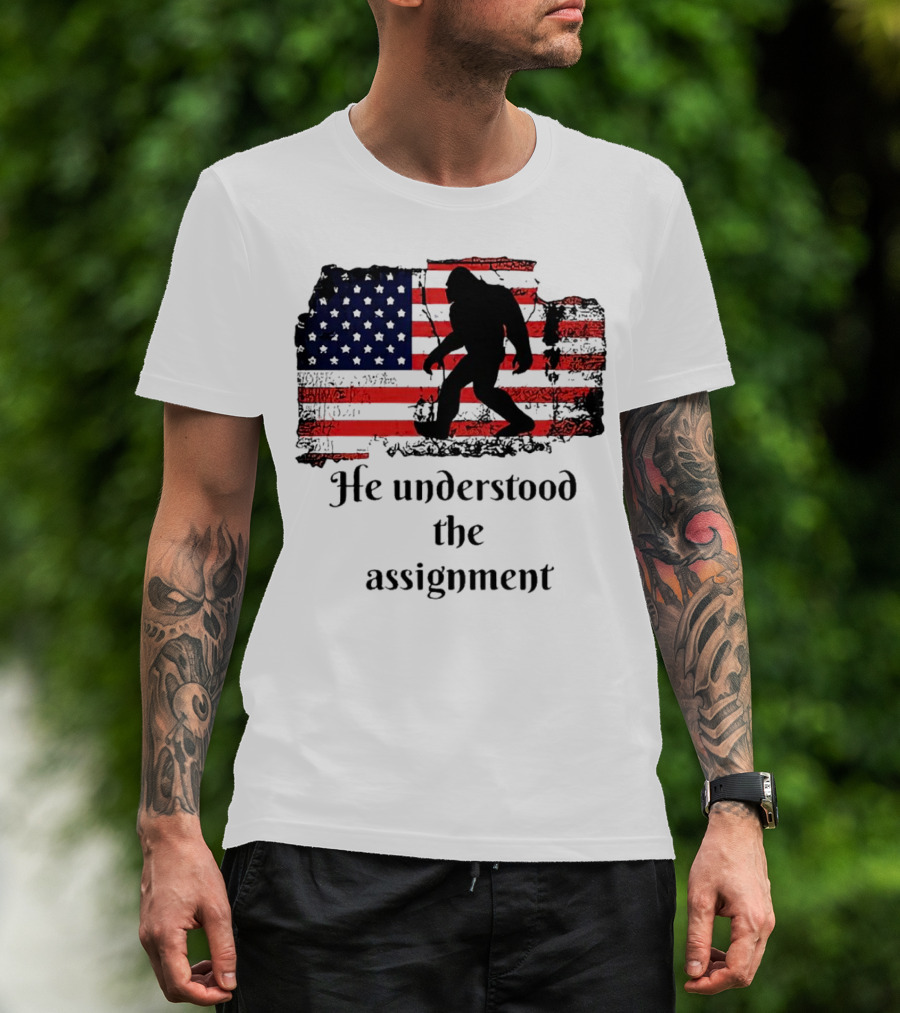 Bigfoot Silhouette With Distressed American Flag He Understood The Assignment T-Shirt