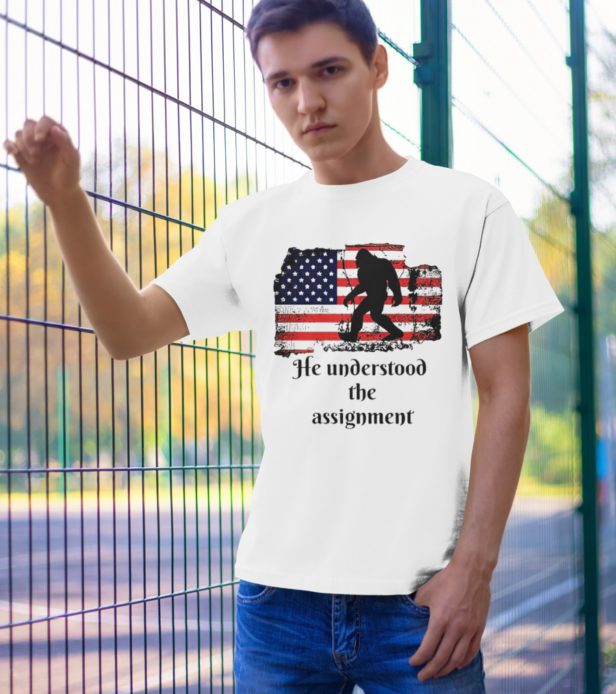 Bigfoot Silhouette With Distressed American Flag He Understood The Assignment T-Shirt