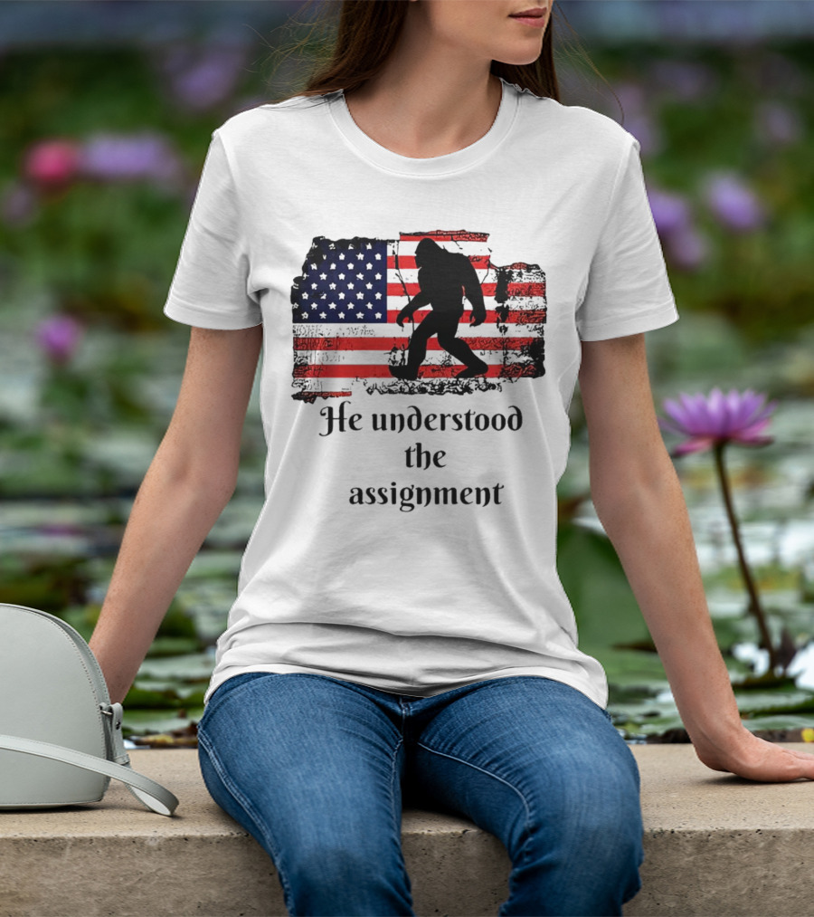Bigfoot Silhouette With Distressed American Flag He Understood The Assignment T-Shirt