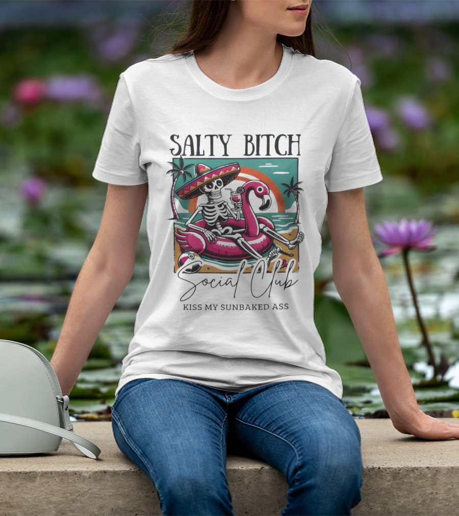 Salty Bitch Skeleton On Flamingo Float In Sunset Beach Scene With Kiss My Sunbaked Ass Text T-Shirt