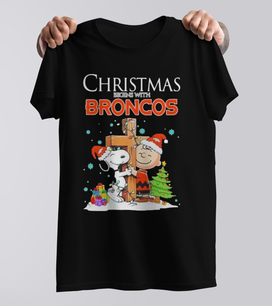 Christmas Begins With Broncos Charlie Brown Snoopy Hug Cross T-Shirt
