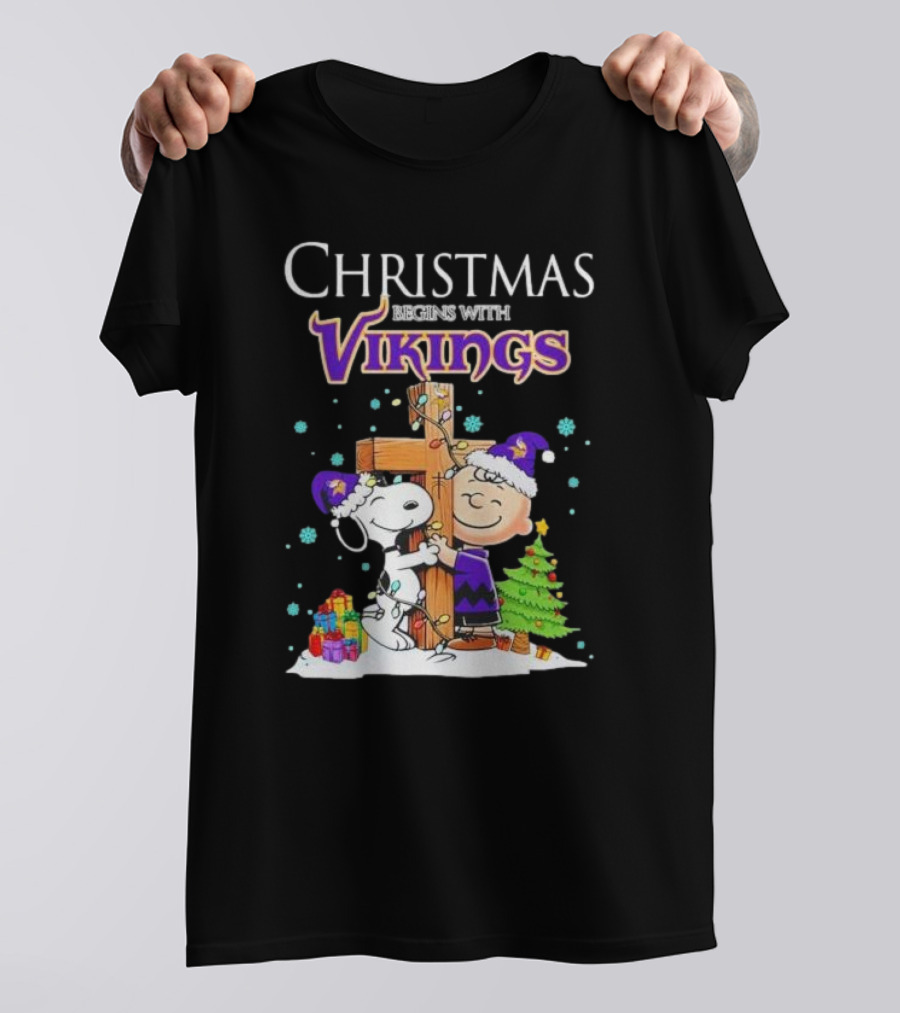 Christmas Begins With Minnesota Vikings Charlie Brown Snoopy Hug Cross T-Shirt