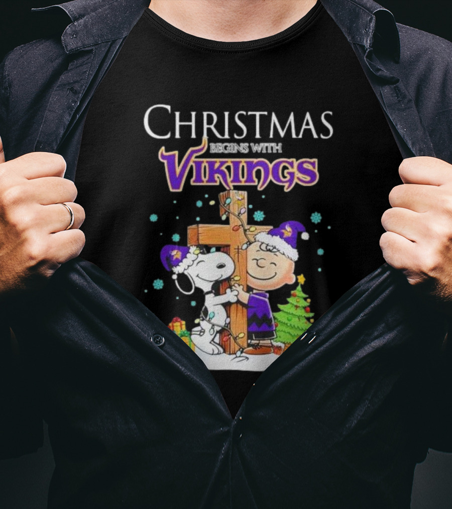 Christmas Begins With Minnesota Vikings Charlie Brown Snoopy Hug Cross T-Shirt