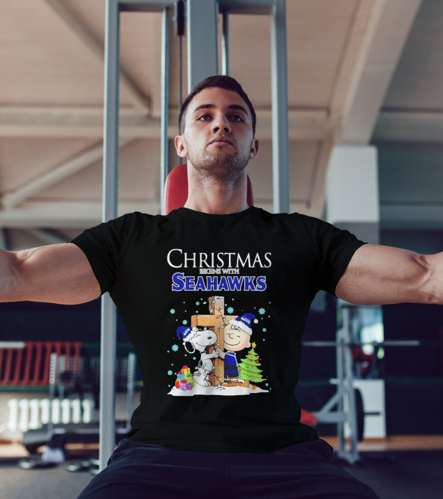 Christmas Begins With Seahawks Charlie Brown Snoopy Jesus Cross T-Shirt