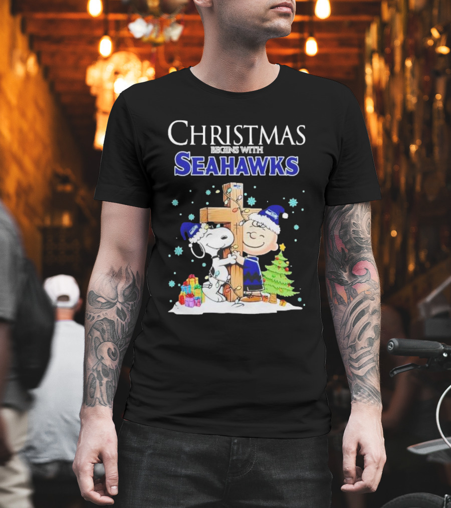 Christmas Begins With Seahawks Charlie Brown Snoopy Jesus Cross T-Shirt