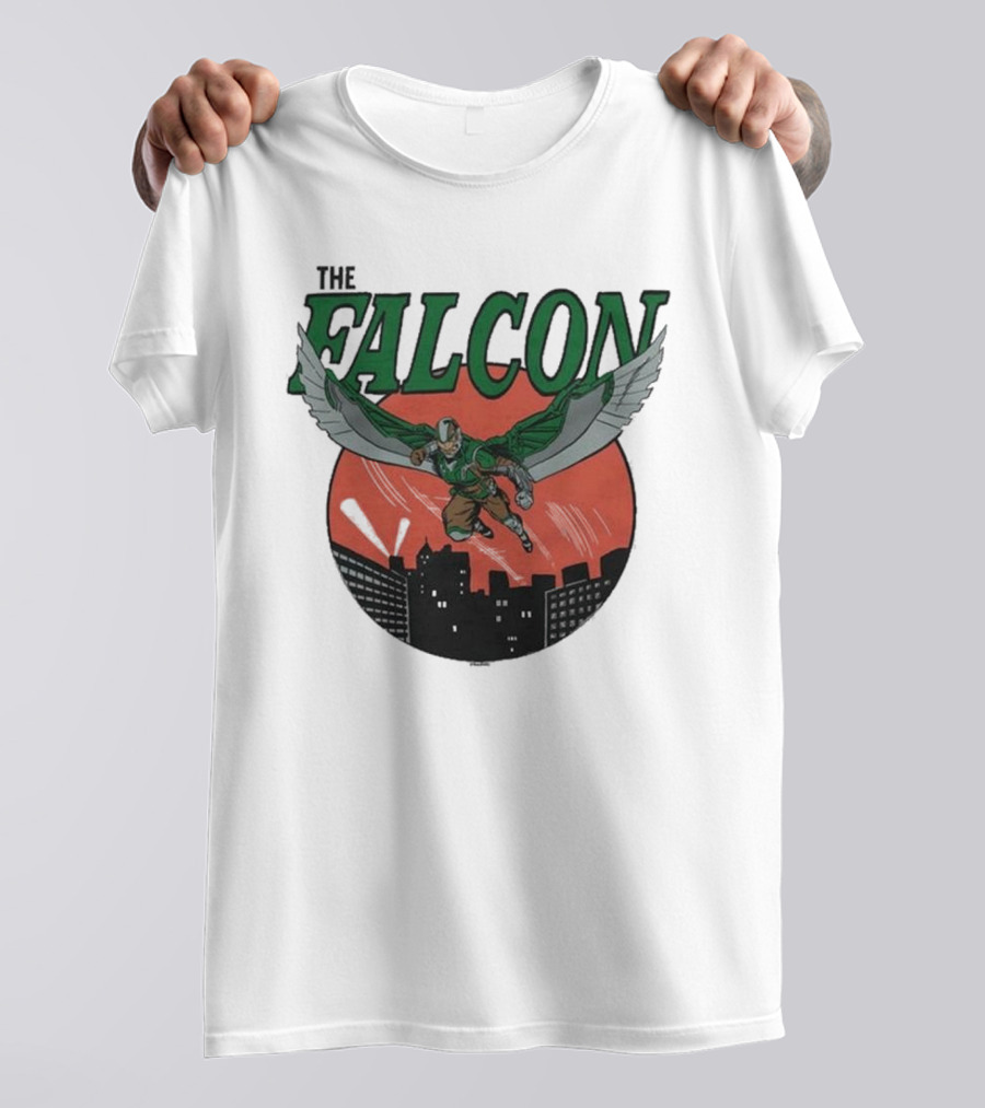 The Falcon Soaring Over City Skyline In Action-Packed Comic T-Shirt