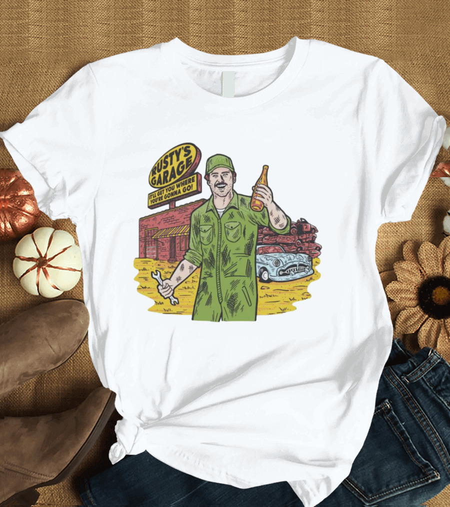 Rusty’s Garage It’ll Get You Where You’re Gonna Go Retro Mechanic Holding Wrench And Drink With Vintage Car And Workshop Scene T-Shirt