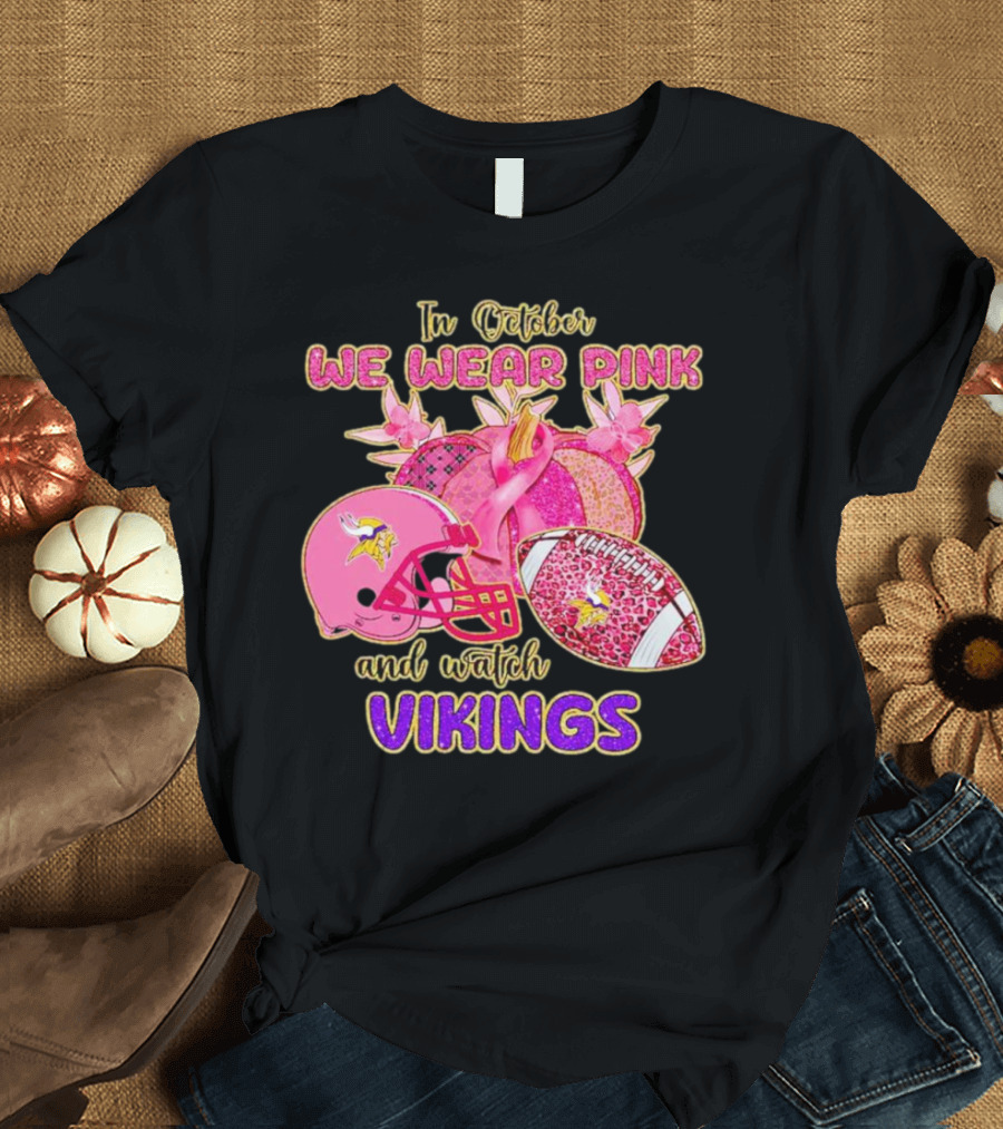 In October We Wear Pink And Watch Vikings Football Helmets Breast Cancer Awareness T-Shirt