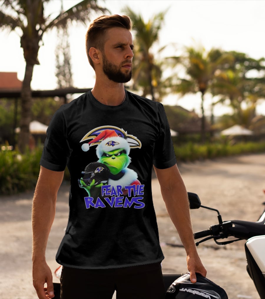 Grinch Wearing Santa Hat Holding Baltimore Ravens Helmet Fear The Ravens T-Shirt