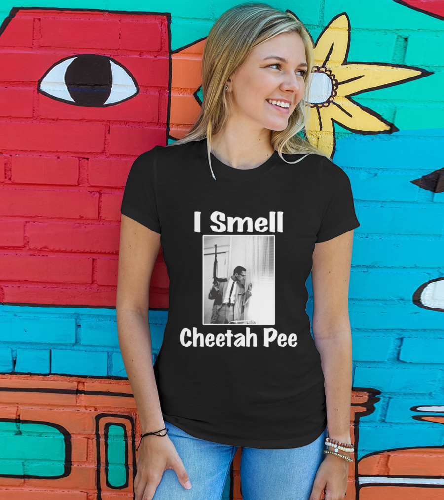 I Smell Cheetah Pee Man Holding Gun By Window T-Shirt