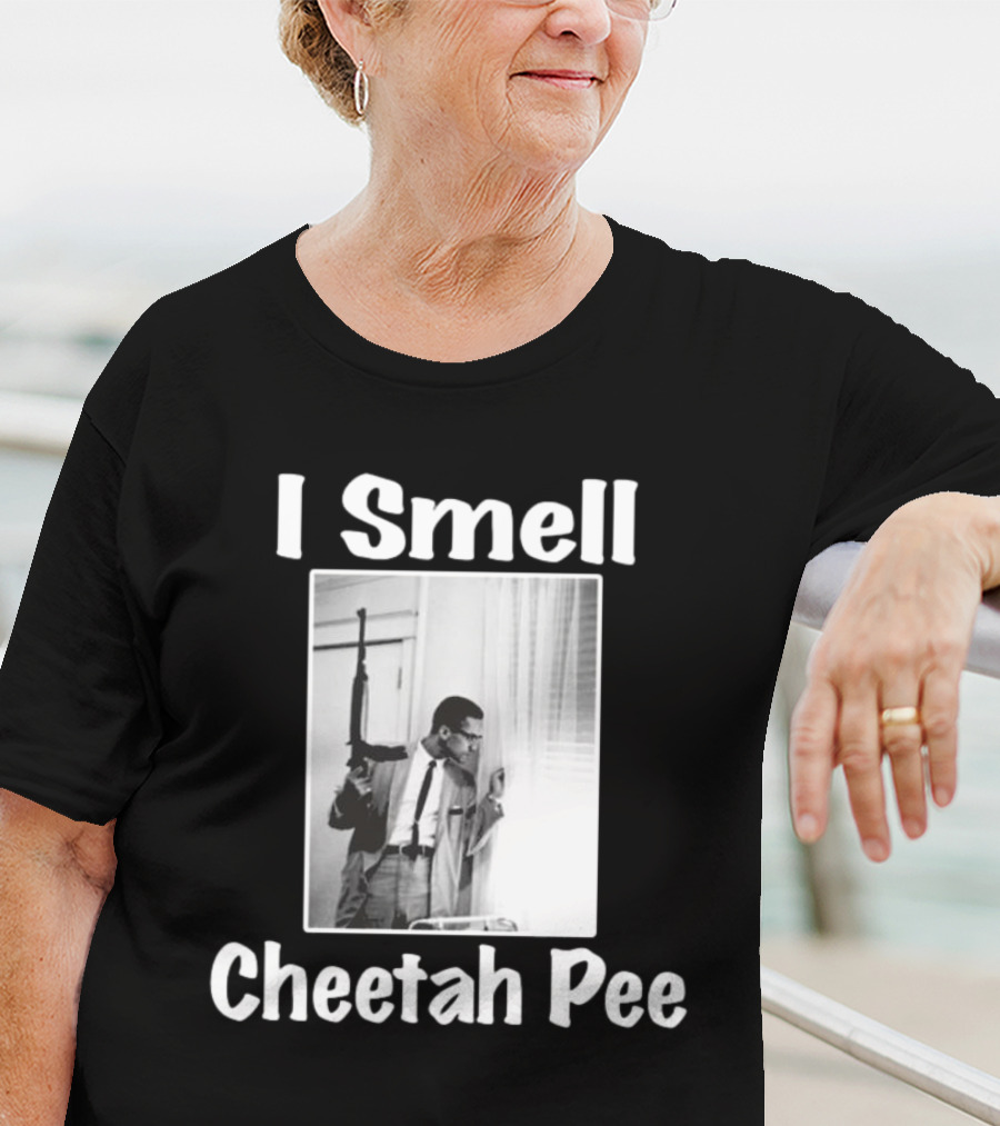 I Smell Cheetah Pee Man Holding Gun By Window T-Shirt