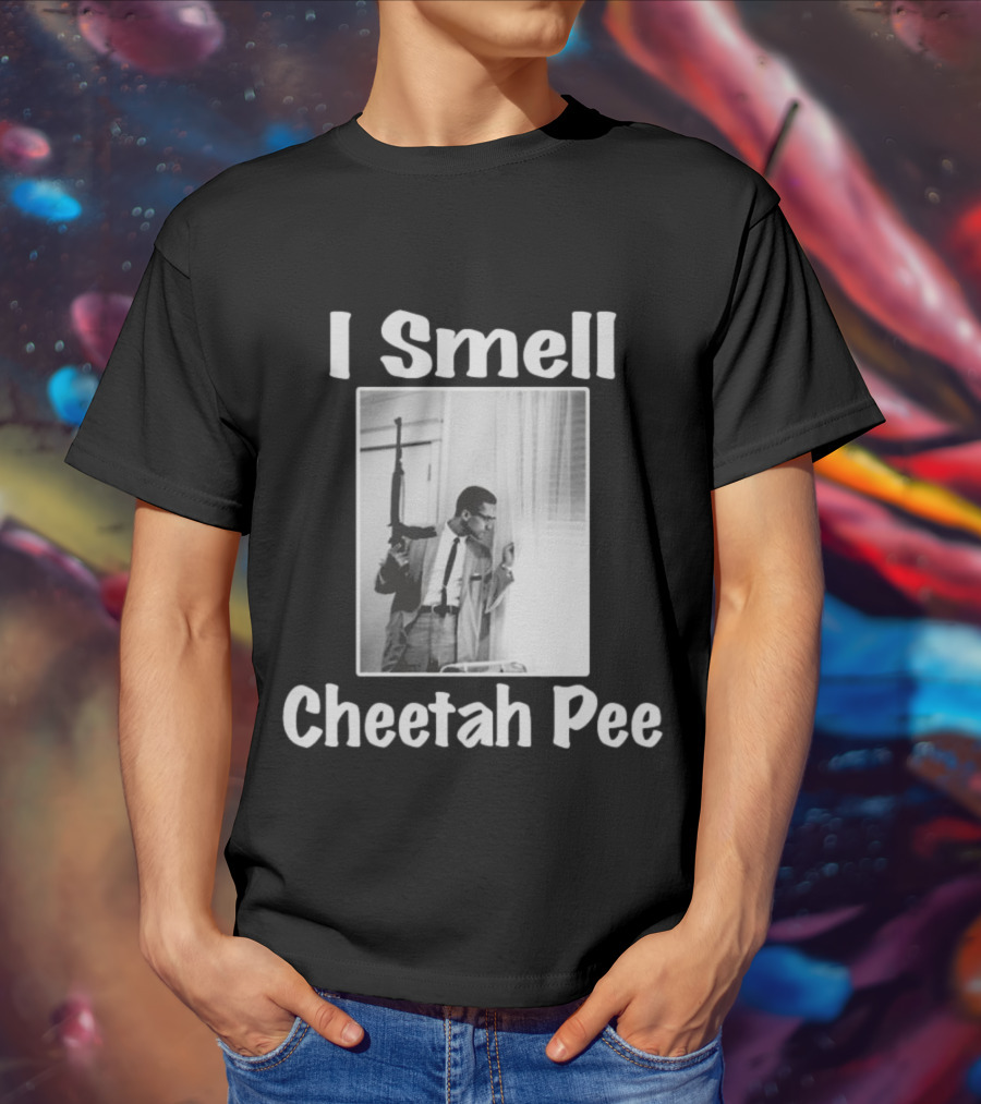 I Smell Cheetah Pee Man Holding Gun By Window T-Shirt