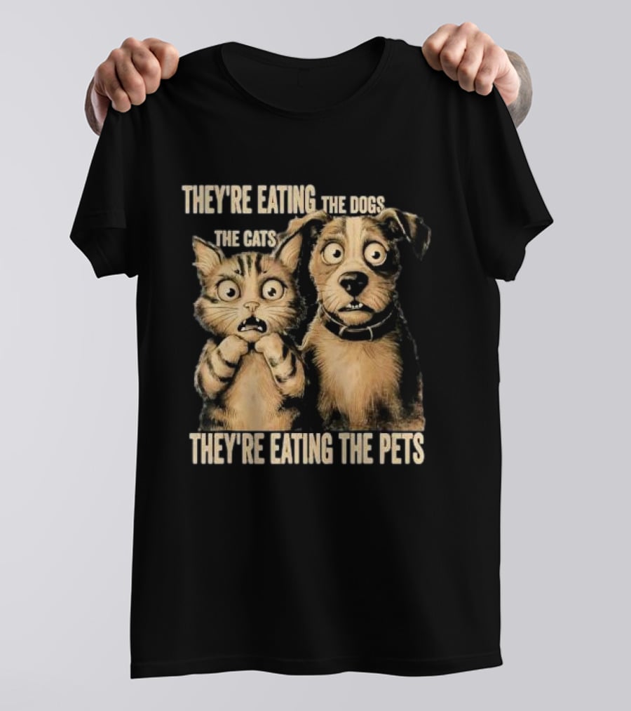 THEY'RE EATING THE DOGS THE CATS THEY'RE EATING THE PETS T-Shirt